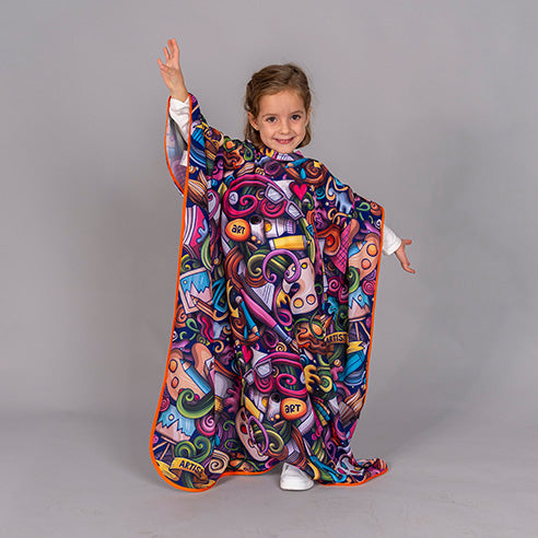 CAPA DE PELUQUERIA INFANTIL ESTAMPADA